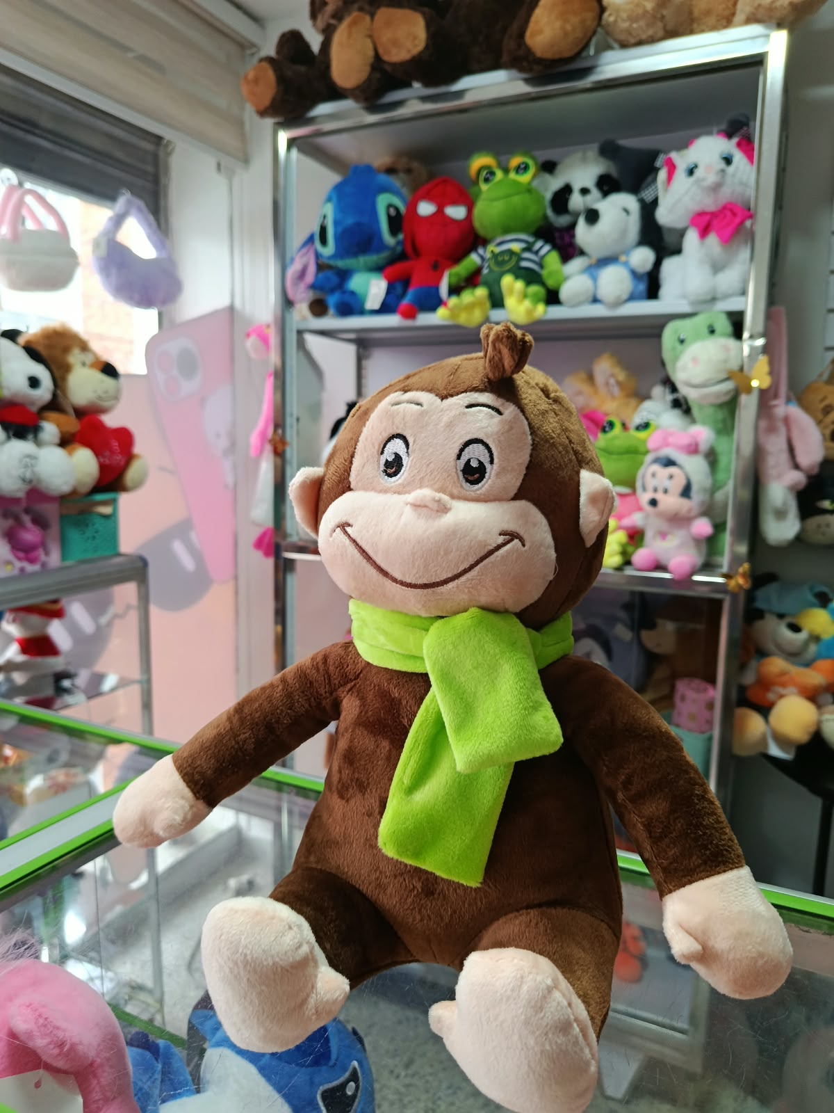 PELUCHE MONO JORGE EL CURIOSO 32cms